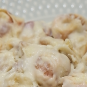 Tortelli Listrado de Brie e Parma